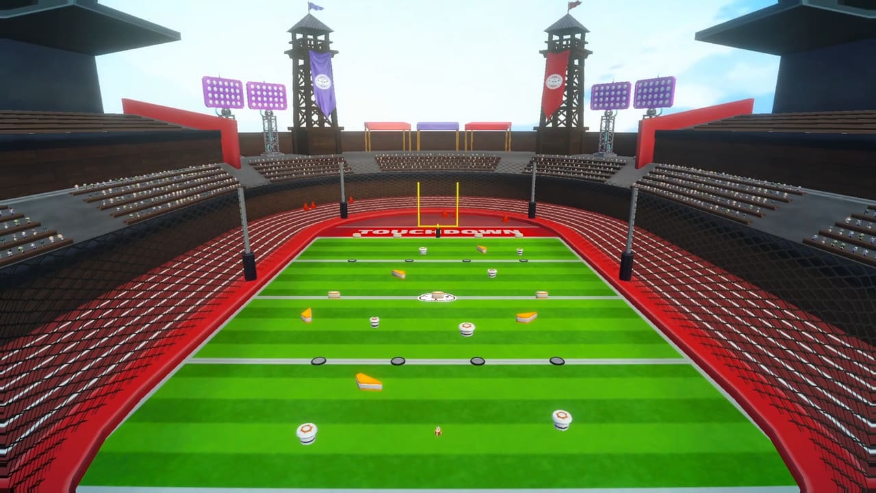 Captura de Rugby: el campo del estadio con la zona de ensayo marcada TOUCHDOWN y los postes al fondo